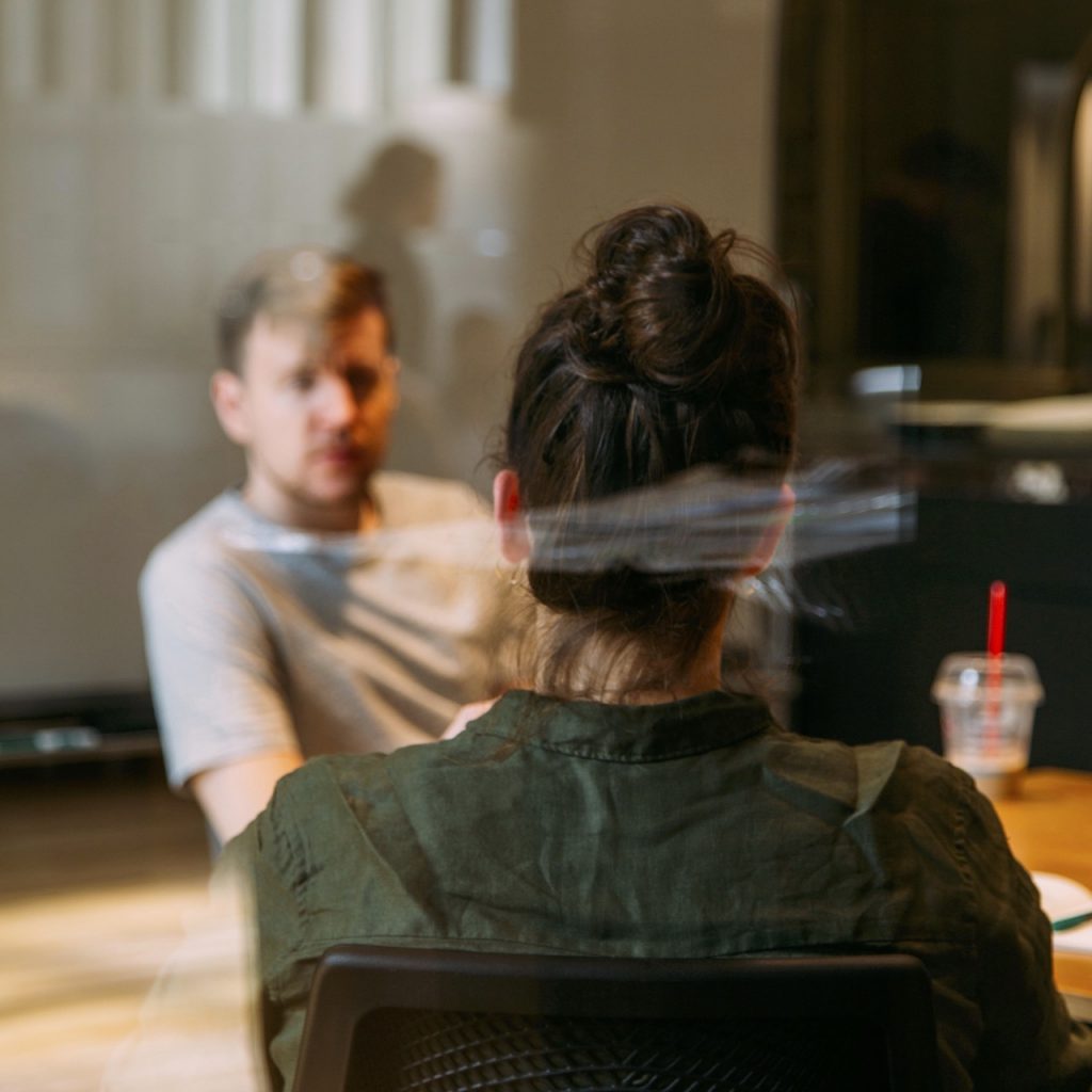 Restorative Justice example Unsplash meeting anonymous charles-deluvio-rRWiVQzLm7k-unsplash